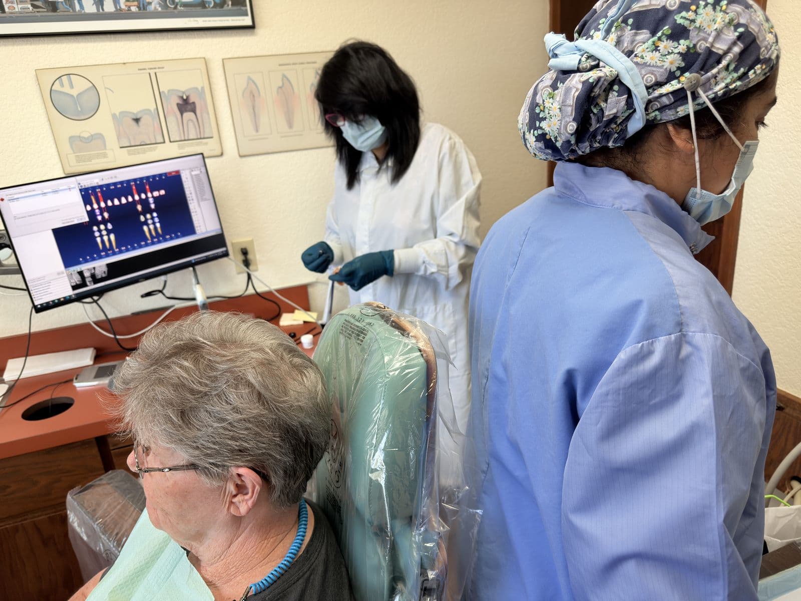 Doctor and assistant working together on a patient